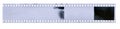 Strip of old celluloid film with dust and scratches