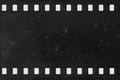 Strip of old negative celluloid film with dust and scratches