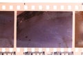 Strip of old, worn and bad developed color celluloid film