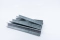 Strip of staples isolated against a white background. Office supplies - image Royalty Free Stock Photo