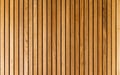 Stripe lath brown wood pattern wall Royalty Free Stock Photo