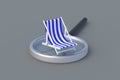 Striped beach chair on magnifier. Search a resort for vacation