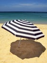 Striped beach umbrella Royalty Free Stock Photo