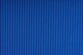 Striped blue embossed paper. Colored paper. Livid texture background.