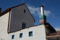 Striped chimney on an old house