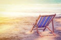 Striped deckchair at ocean sandy beach