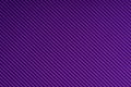 Striped embossed purple paper. Colored paper. Violet color texture background