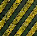 Striped grunge background. Green-yellow textured cracked background