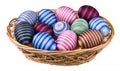 Striped hand-decorated Easter eggs in wicker basket isolated on white background