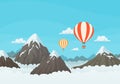 Striped hot air balloons flying over snowy mountains and clouds with blue sky in the background. Vector Royalty Free Stock Photo