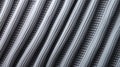 A striped monochrome textile pattern dances across a white fabric