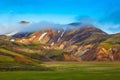 Striped mountains of rhyolite covered sunrise