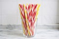 striped paper drink straws on a marble counter