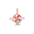 Striped peppermint candy mascot cartoon character style making silent gesture