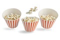 Striped Popcorn Buckets and Flying Popcorn Kernels Royalty Free Stock Photo