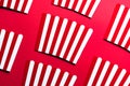 Striped Popcorn Empty Boxes Flat Lay Modern Art. Cinema and Entertainment Background Royalty Free Stock Photo