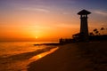 Striped red white lighthouse on the coast of the Caribbean Sea. Dominican Republic. Royalty Free Stock Photo