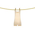 Striped retro swimsuit hanging on rope