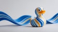 Striped rubber duck with flowing blue ribbon pattern and playful expression, studio background, whimsical mood Royalty Free Stock Photo