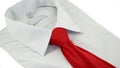 Striped shirt with red silk necktie over white
