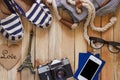 Striped slippers, camera, phone and miniature of Eiffel Tower, top view