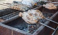 Striped snakehead fish grilled with salt. Pomegranate fish with salt and then burned for sales in the market. Thai style street f Royalty Free Stock Photo