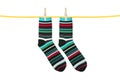 Striped socks hanging isolated on white Royalty Free Stock Photo