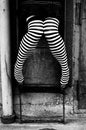 Striped stockings on ladder Royalty Free Stock Photo