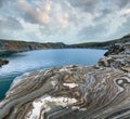 Striped stone near reservoir Storglomvatnet (Norge Royalty Free Stock Photo