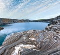 Striped stone near reservoir Storglomvatnet (Norge Royalty Free Stock Photo