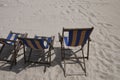Striped sunchairs on the beach Royalty Free Stock Photo