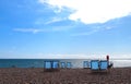 Striped deckchairs on the beach in Brighton, England Royalty Free Stock Photo