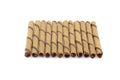 Striped wafer rolls filled with chocolate Royalty Free Stock Photo