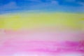 Striped watercolor background blue, yellow and pink. Hand painted watercolor background