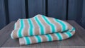 Stripes warm blanket isolated on the table Royalty Free Stock Photo