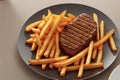 Striploin beef steak with french fries on dark background. Freshly grilled. Healthy dinner, generative ai