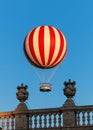 Stripped air ballon fly in blue sky Royalty Free Stock Photo