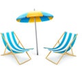 Stripped deck-chair with umbrella beach inventory Royalty Free Stock Photo