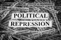 Strips of newspaper with the words Political Repression typed on them Royalty Free Stock Photo