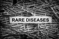 Strips of newspaper with the words Rare Diseases