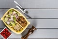 Strips of sauteed chicken and vegetables with vegetable farofa. Brazilian lunch box. Ahead meal preparation or dieting concept. to Royalty Free Stock Photo