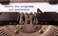 Strive for progress, not perfection - Written on an old typewriter