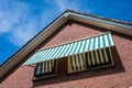 Stroe, Gelderland, The Netherlands, Roof construction with sun sheds against blue sky