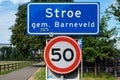 Stroe, Gelderland, The Netherlands, Sign indicating borrow and municipality as well as a 50 km per hour speed limit at the Veluwe