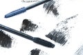 Stroke of black mascara with applicator brush close-up, isolated on white background. Royalty Free Stock Photo