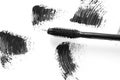 Stroke of black mascara with applicator brush close-up, isolated on white background. Royalty Free Stock Photo