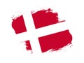 Stroke brush textured flag of denmark on white background