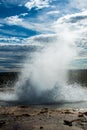 Strokker Geyser erupting Icelands Geothermal Area