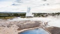 Strokkur geyser eruption and Geysir in Haukadalur Royalty Free Stock Photo