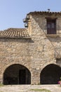 Through the narrow cobbled street at Ainsa village, Aragon, Spain Royalty Free Stock Photo